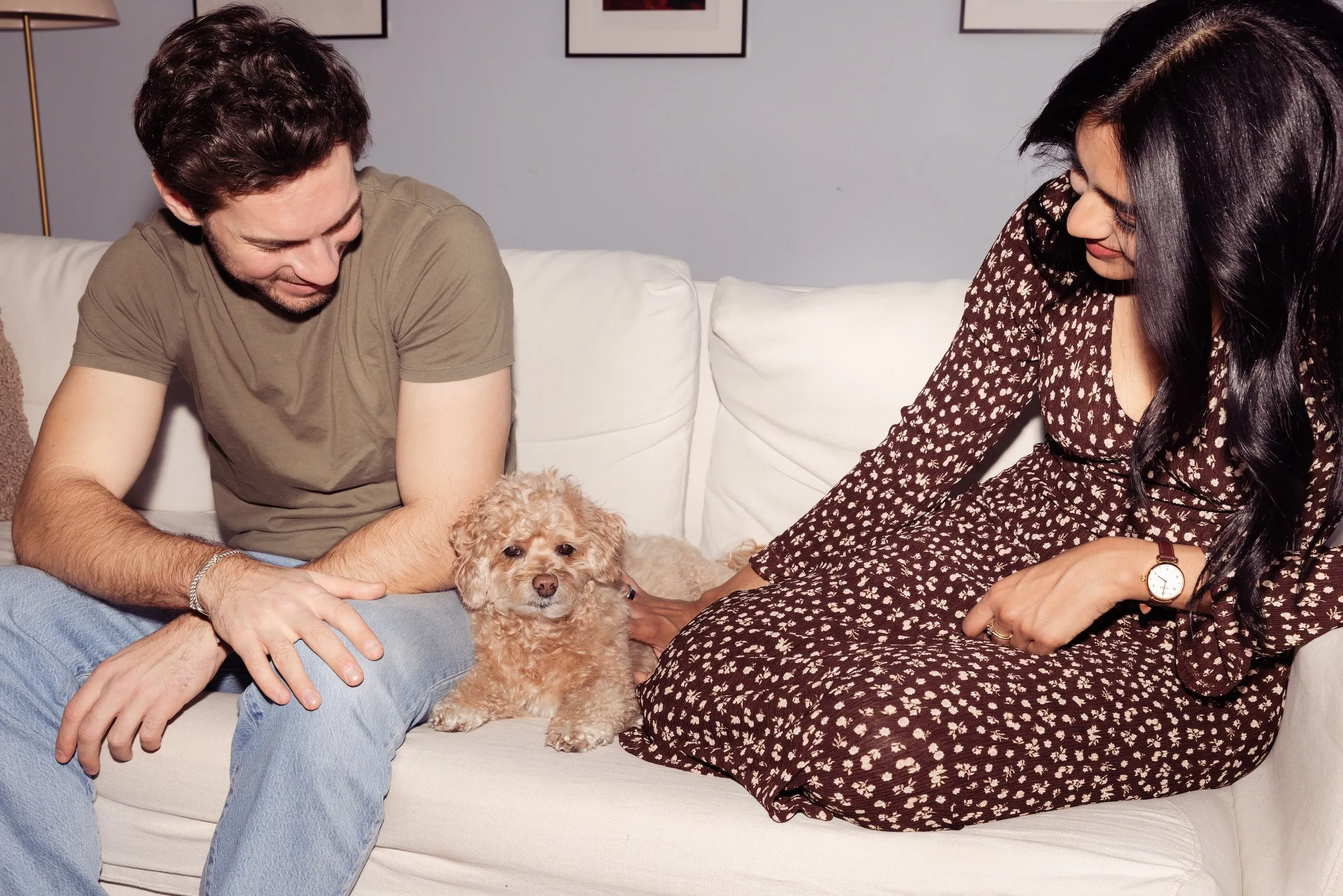 Omi Health founders Sindu and Jakob at home with their dog